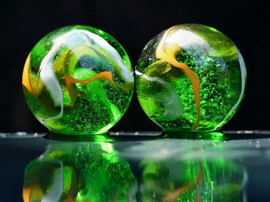 Green Glass Marbles Close Up for Wallpaper