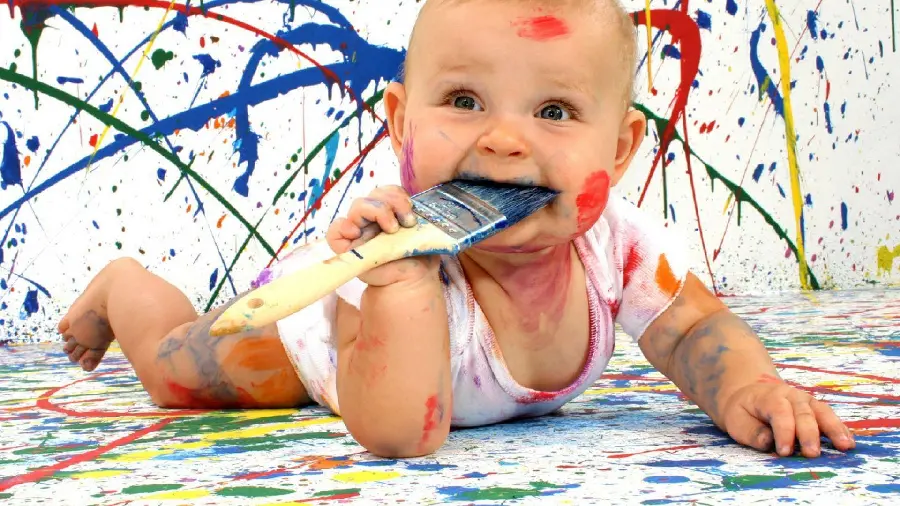 Cute and funny boy painter drawing