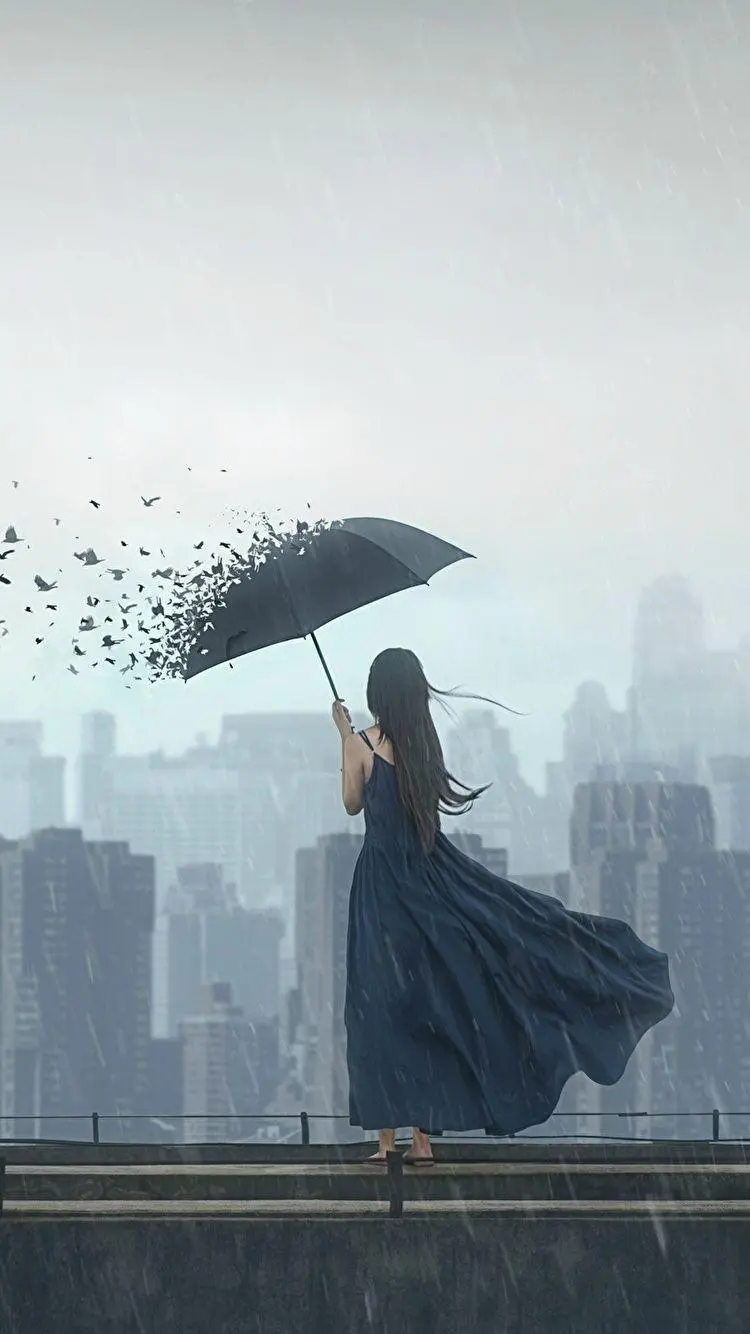Fantasy profile photo of a girl with an umbrella in the wind