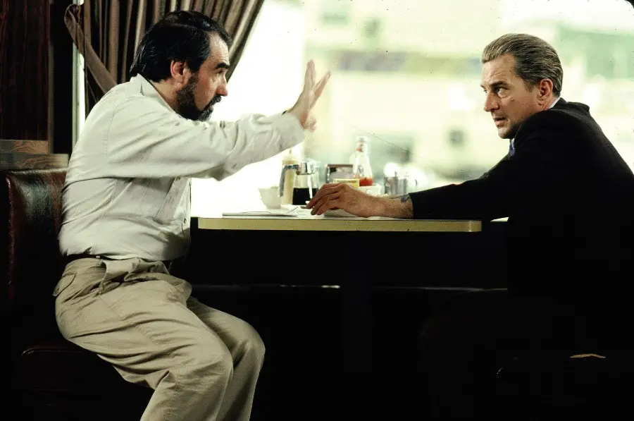 Image of film directors talking to each other on the set