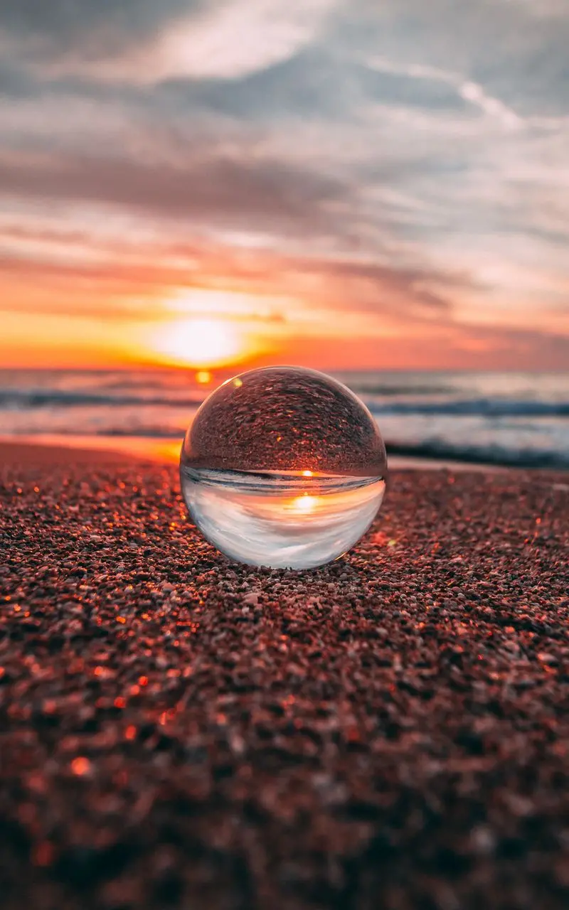 Sea glass transparent bubble at sunset