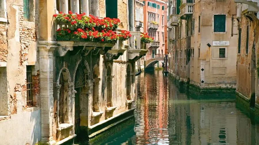 Photo of stone houses by the river in Italy