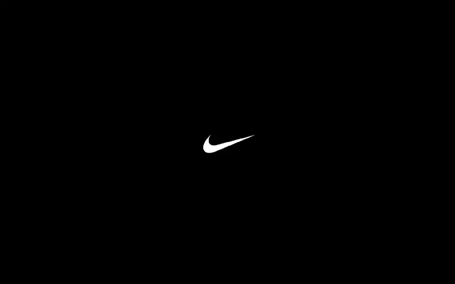 White Nike Logo Photo on a Black Background in 8K Quality