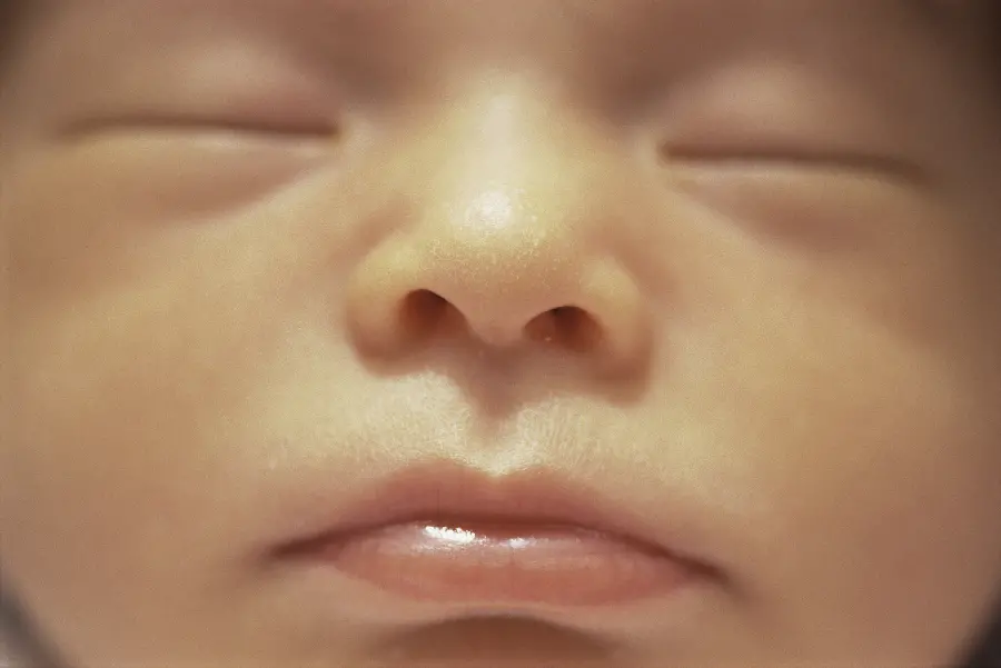 Baby face photo and baby face photo from the front Close