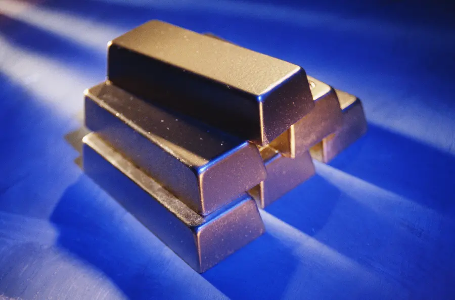 Photo of abundance of money and wealth of gold bars