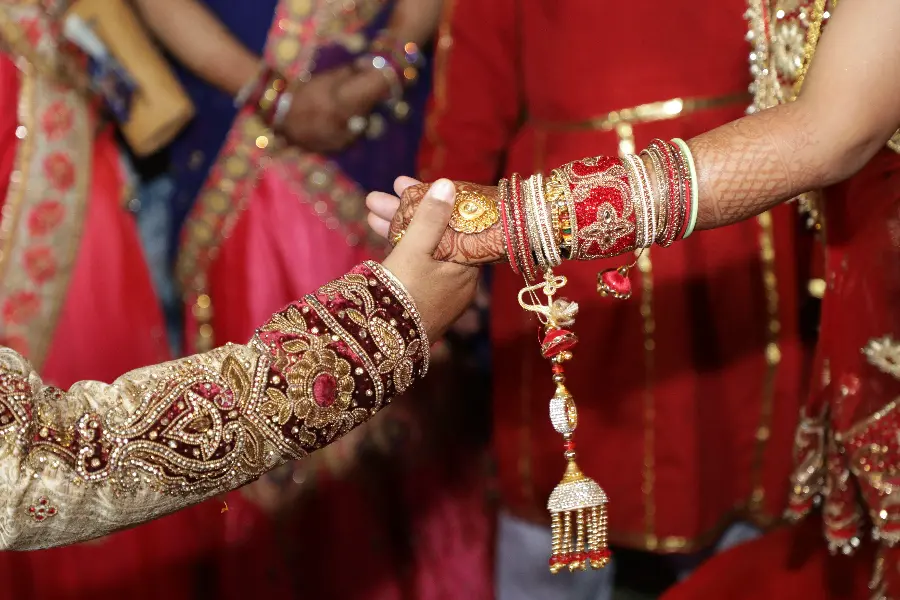 Wedding hands in Indian wedding ceremony high quality photo