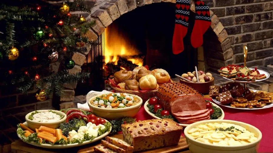 Photo of a dining table with Italian food by the fireplace