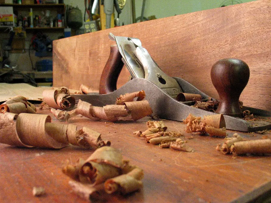 Image inside a carpentry workshop polishing wood